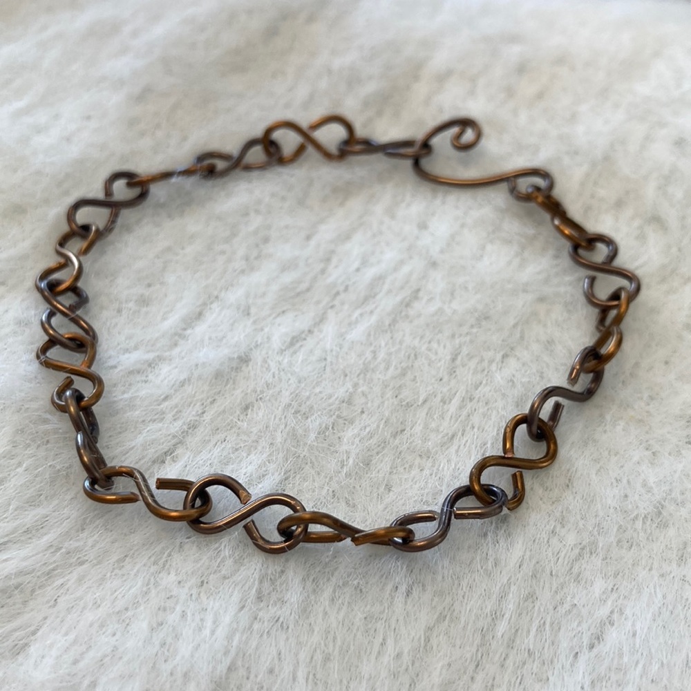 Hand crafted two toned copper bracelet hand crafted band.